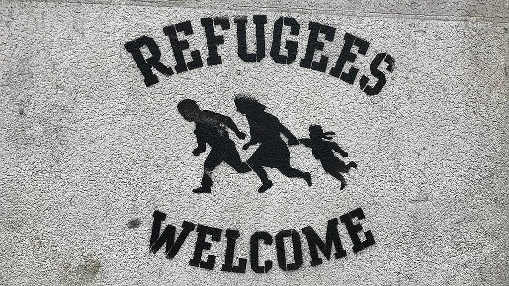 Illustration - Grande-Bretagne : « Bienvenue aux migrants ! »
