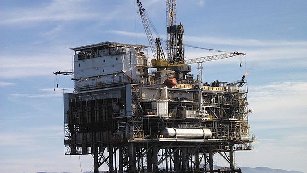 Illustration - Canada : de belles résolutions... engluées dans le pétrole